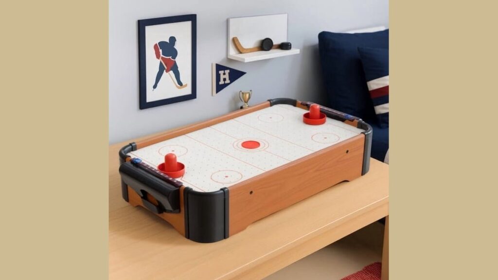 Air hockey table with mallets in a bright garage game room