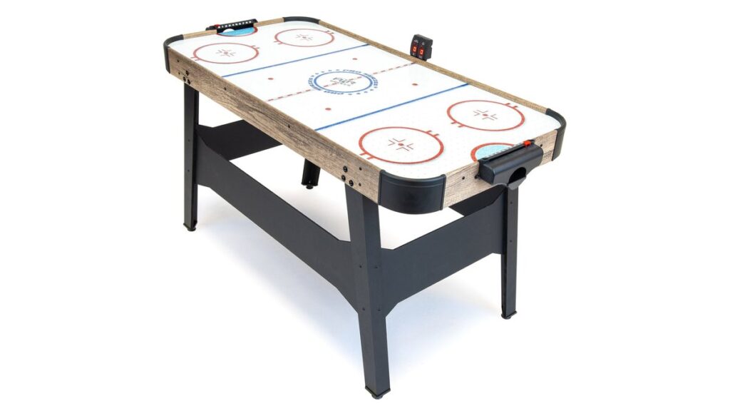 A new air hockey goal net replacement kit being installed on a game table.