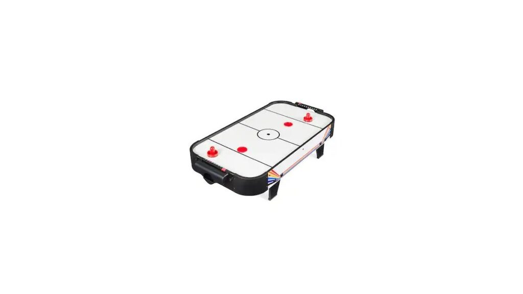 A professional arcade style air hockey table located in a stylish residential game room.